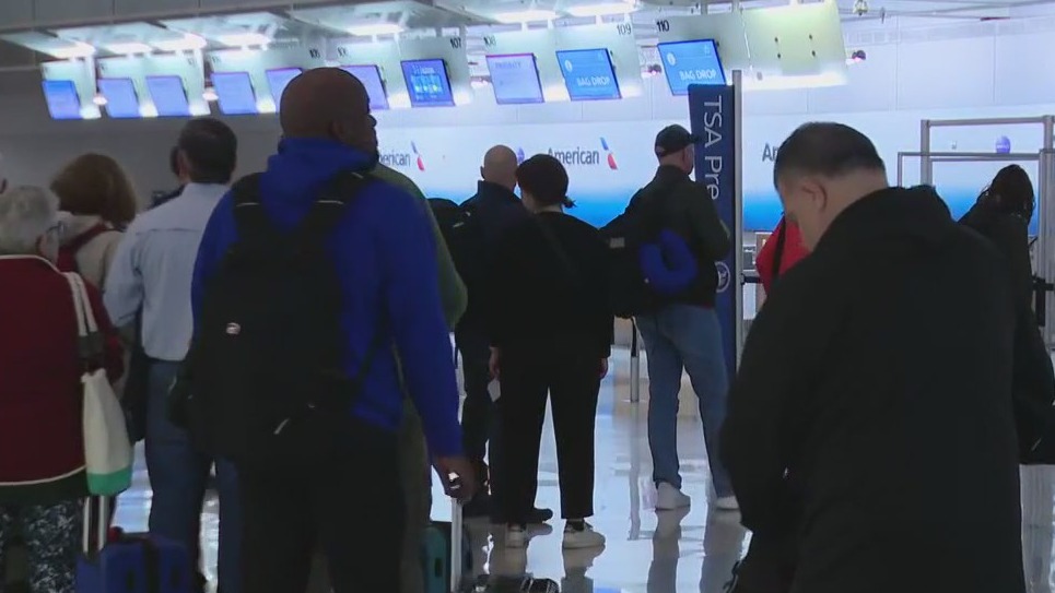 Travelers pack DFW for Christmas flights