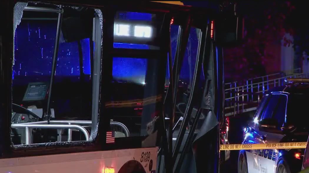 One killed, six injured after truck hits bus