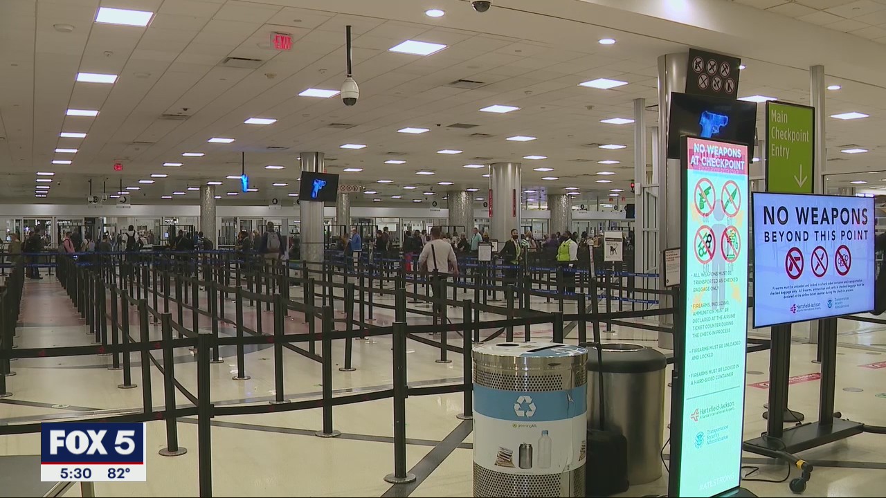 Atlanta city officials react to a loaded handgun found in a passenger's luggage