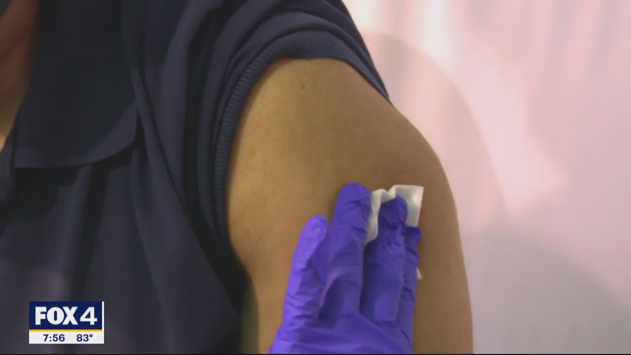 Americans urged to get COVID & flu shots this fall