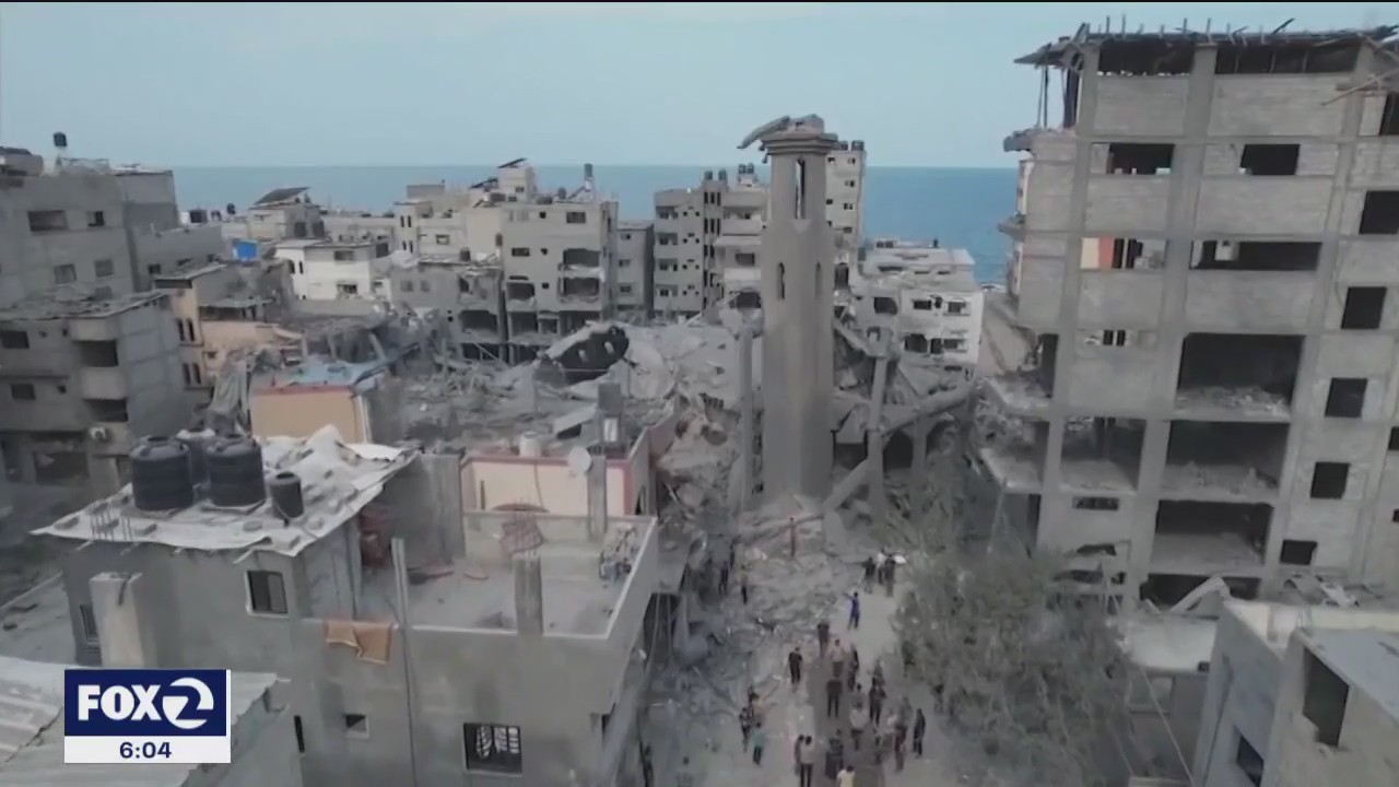Mothers with children in Israel react to attacks