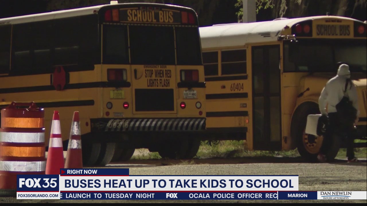 Buses heat up to take kids to school on cold day