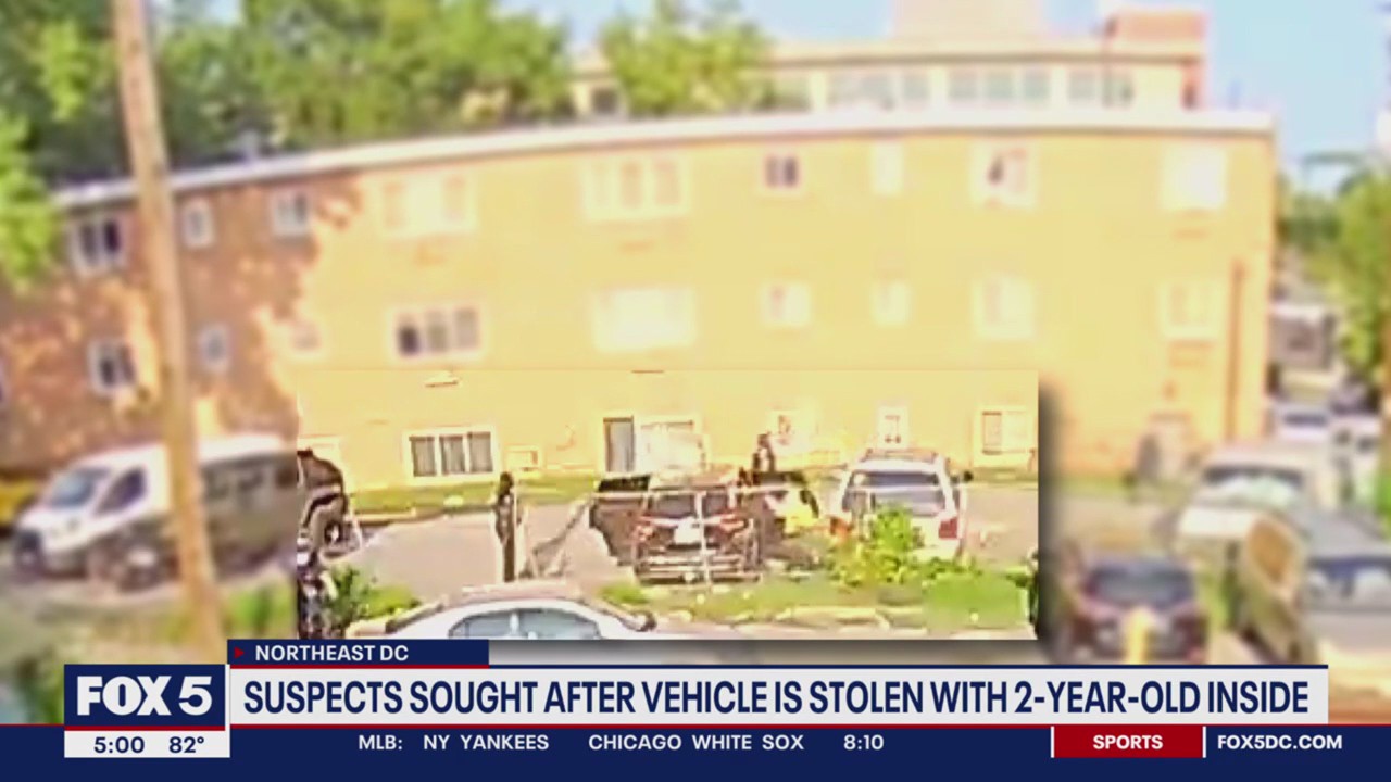 Suspects sought after car stolen with 2-year-old inside