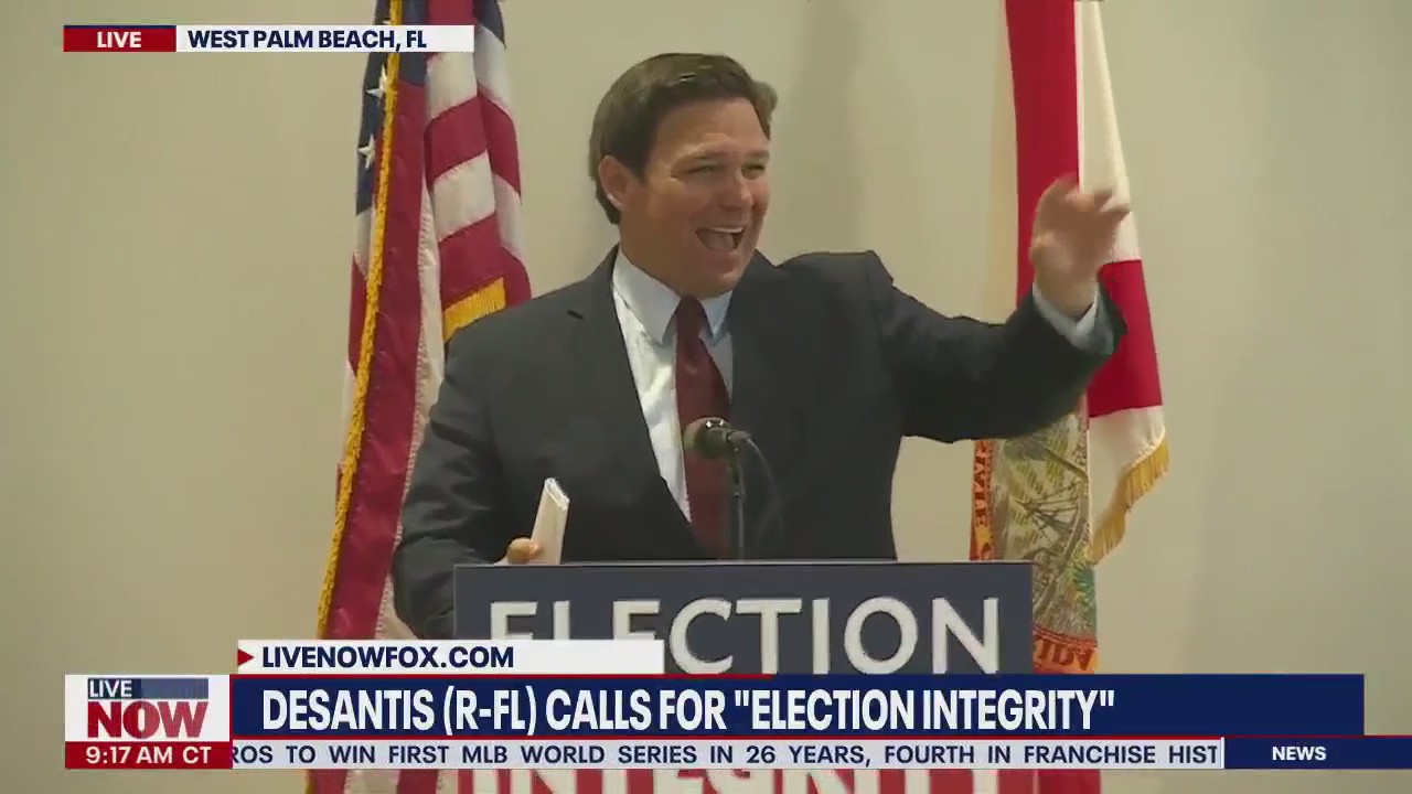 DeSantis protester removed as governor laughs