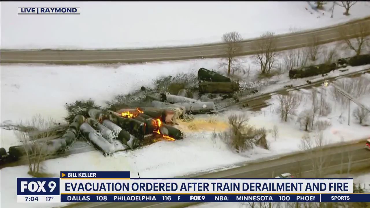 Train derails, starts on fire in Raymond, Minnesota