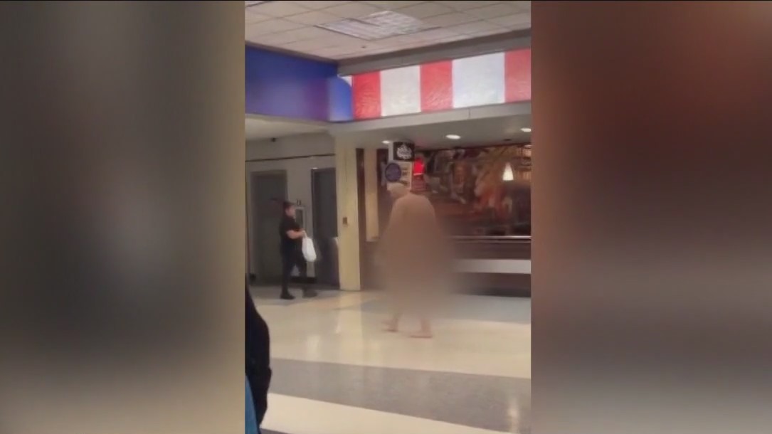 Naked man at Dallas airport arrested