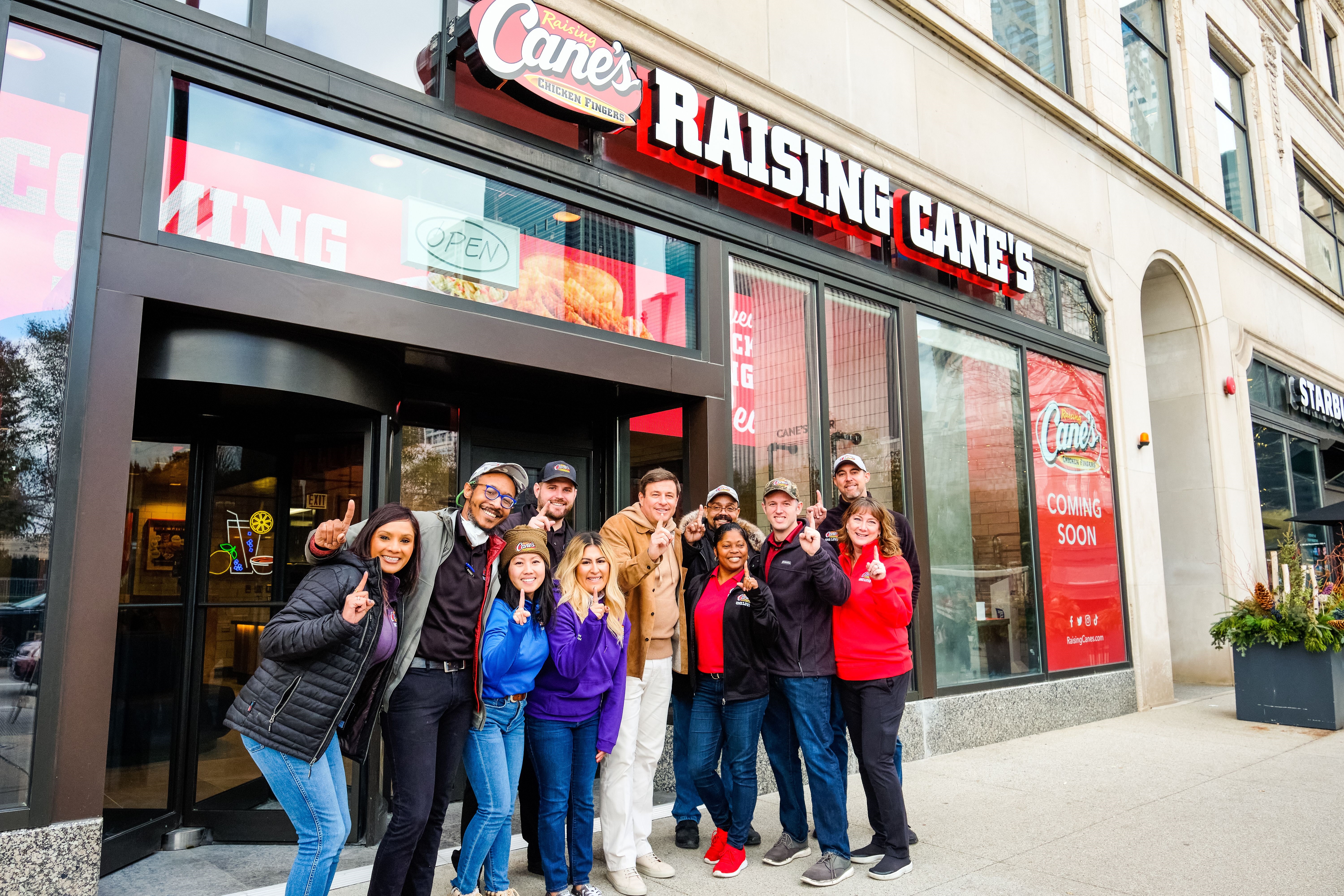 Line of customers wraps around new Raising Cane's in downtown Chicago